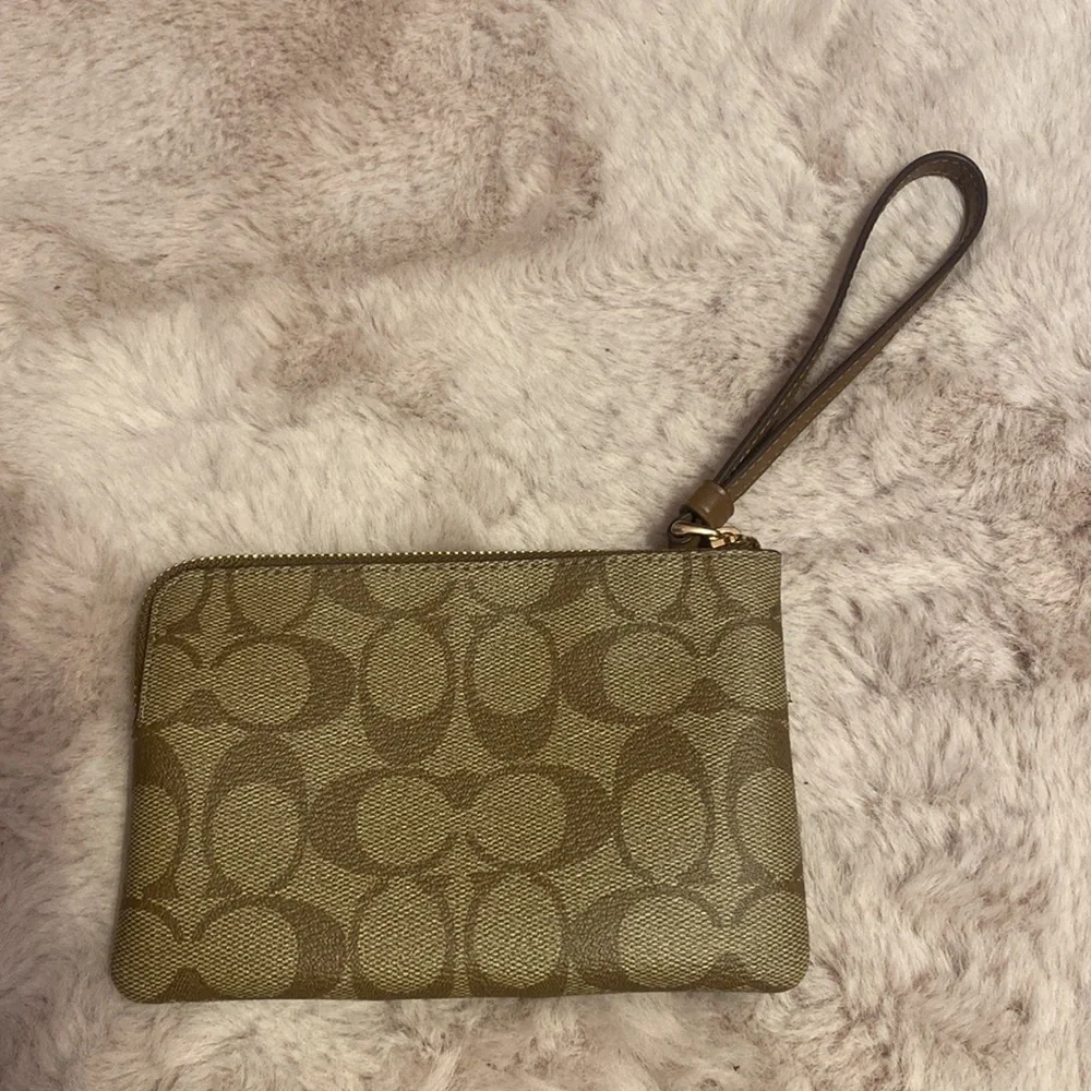 Brand new coach wristlet in brown signature canvas